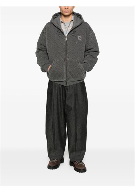 hooded vista quilted sweat jacket man black dyed CARHARTT WIP | I03566589.GD